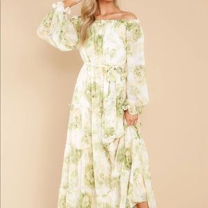 elegant silhouette combined with the stunning green florals